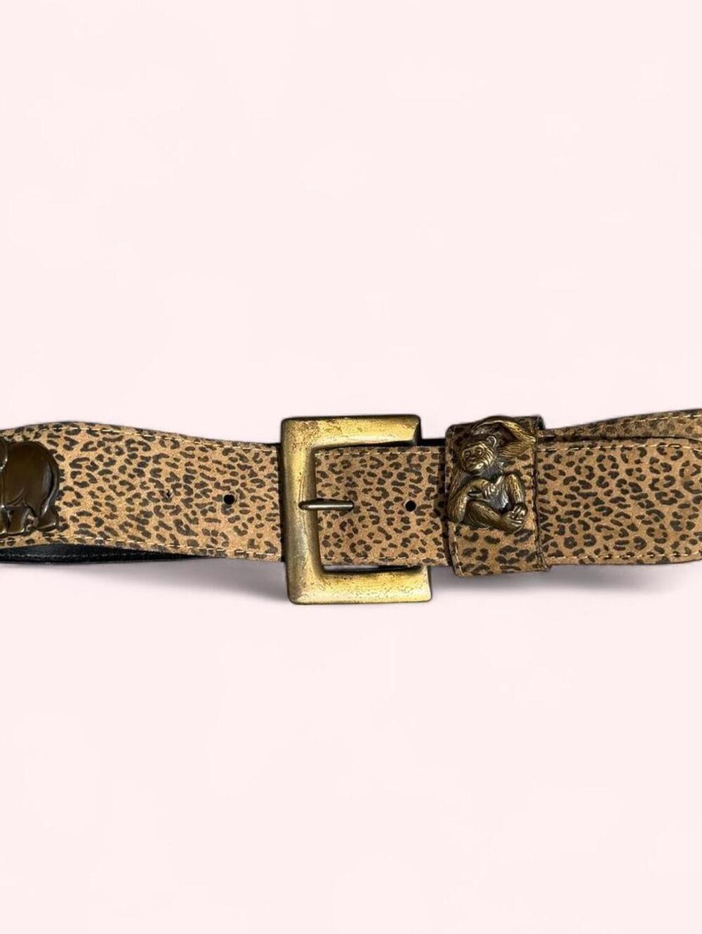 Leopard print western belt with animal accents throughout and chunky buckle!